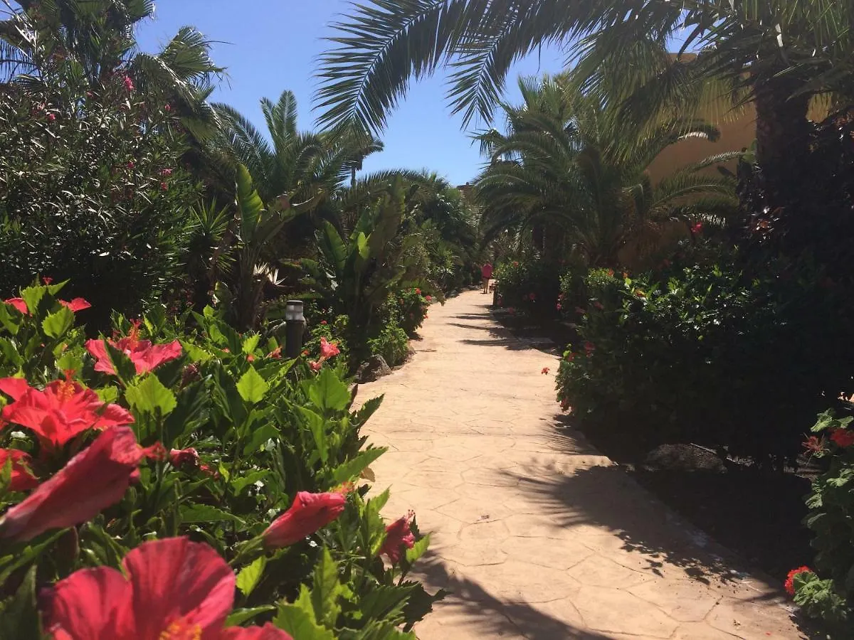 Tropical Garden Retreat: Private Terrace & Pool Oasis Apartment Corralejo
